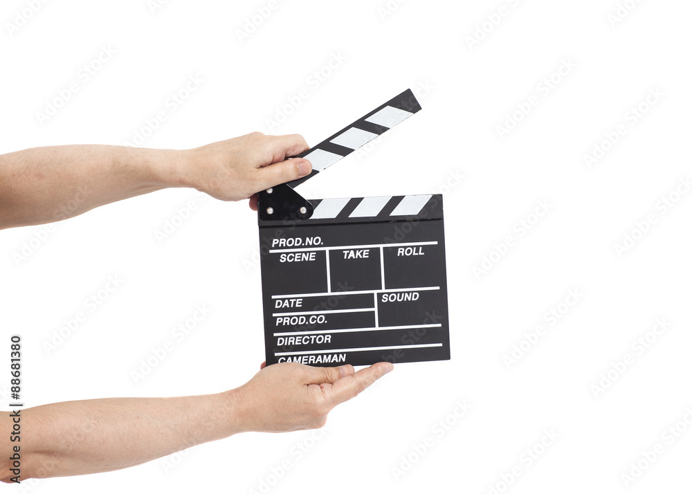 Naklejka premium Hands holding film clapperboard isolated on white