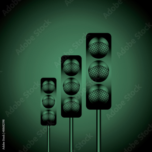 traffic signal over green black background 