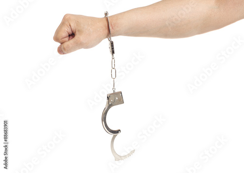 man hand with handcuffs isolated on white background