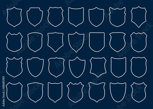 Large set of white shields on blue background