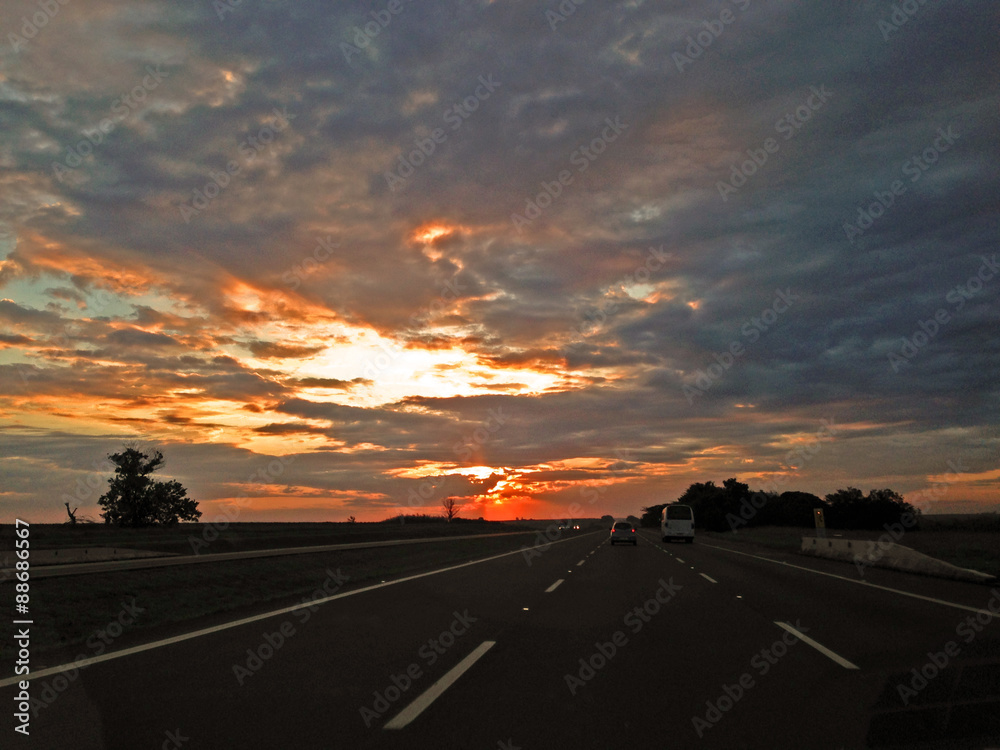 sunset with colorfull sky  on the road