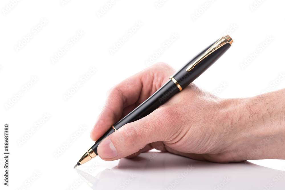 Man holding a black ball pen in his hand, isolated Man holding a black ball pen in his hand, isolated