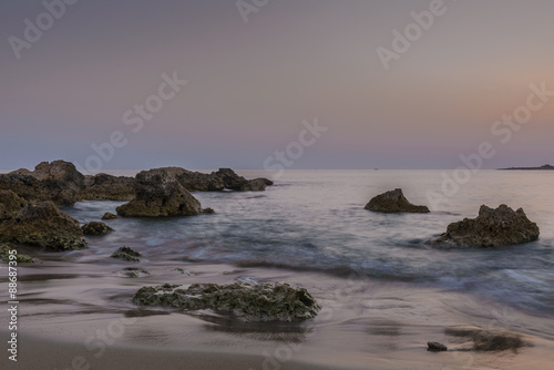 Sunset over the beach on the Mediterranean island of Cyprus.