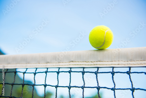 tennis ball with net © Sunanta