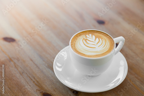 Latte Coffee art on the wooden table