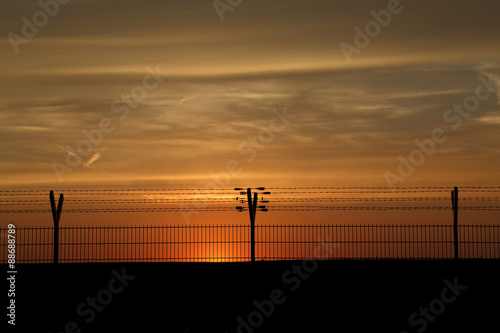 barbed wire at sunset