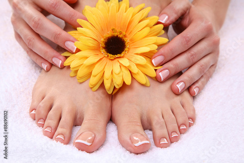 Beautiful feet with perfect spa french nail pedicure