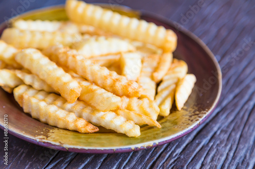 French fries on wood table