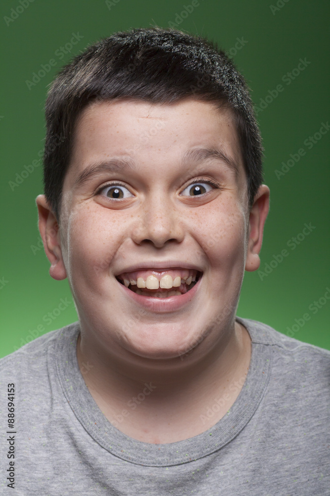 Fototapeta premium Hilarious smiling portrait of young kid
