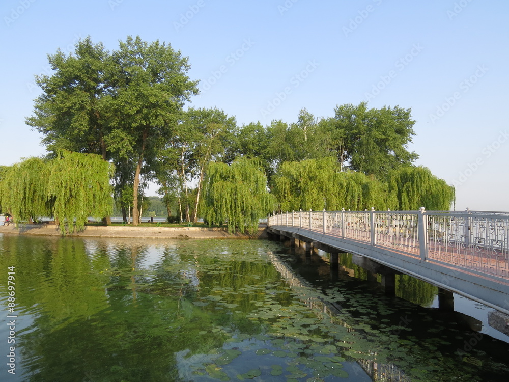Bridge to the largest artificial island in the park. Bridge to the largest artificial island in the park.