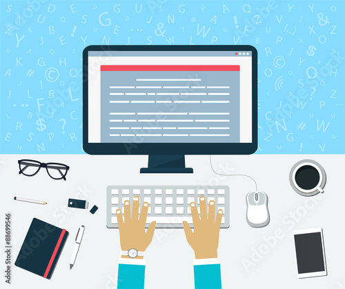 Top view of workplace. Enter of content on the computer