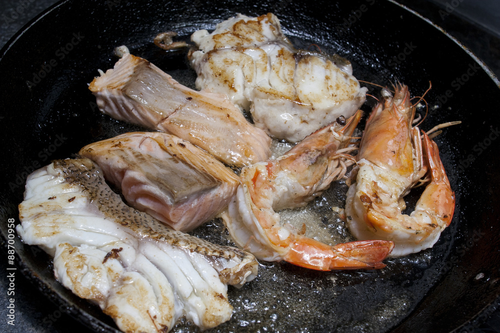 fried seafood tuna dorado fish in a frying pan fried seafood tuna dorado fish in a frying pan