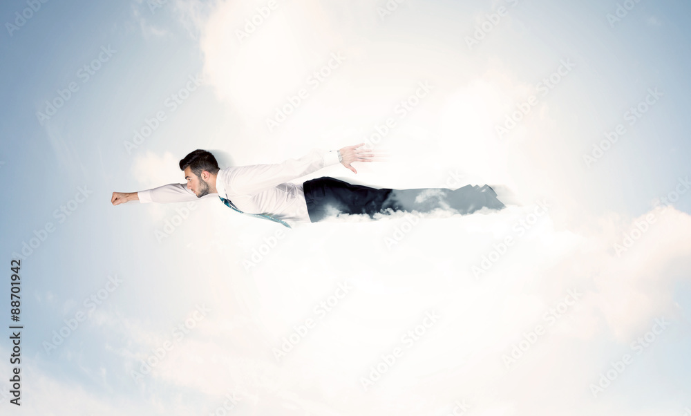 Business man flying like a superhero in clouds on the sky Business man flying like a superhero in clouds on the sky