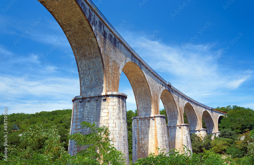 Stone, Railway viaduct over the River Ardeche in France.