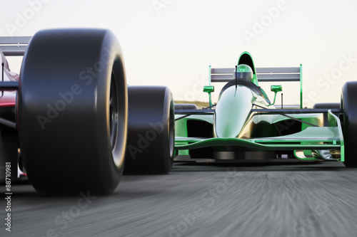 Fotografie Motor sports race car competitive close quarters racing on a track with motion b