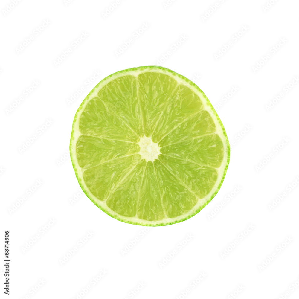 Ripe lime cut in half isolated over the white background Ripe lime cut in half isolated over the white background