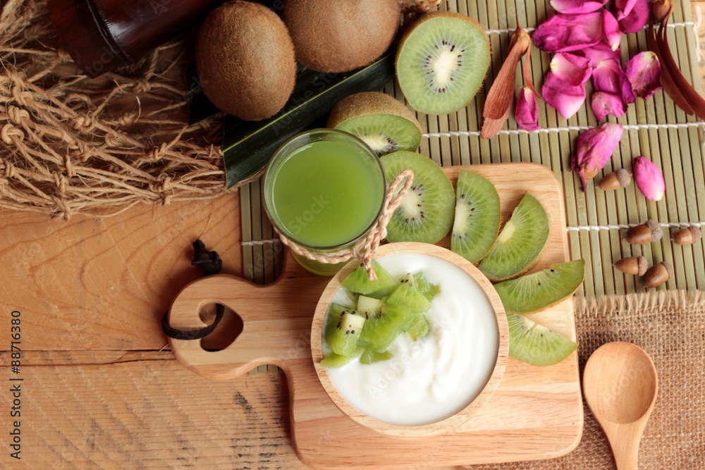 Yogurt white with green kiwi fruit and kiwi juice. Yogurt white with green kiwi fruit and kiwi juice.