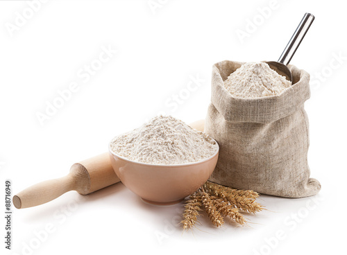 kitchen utensils, ears, flour in a bowl and bag isolated