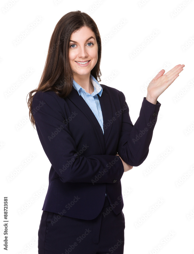 Caucasian businesswoman with hand showing something Caucasian businesswoman with hand showing something