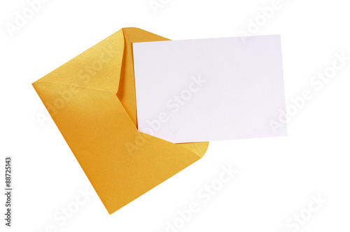 Gold or manila brown envelope with blank white greeting card invite invitation or thank you note photo isolated on white background