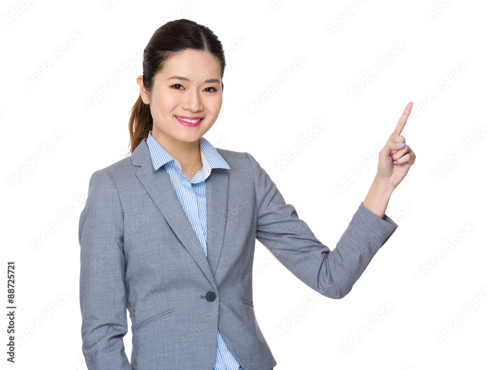 Asian young businesswoman with finger point up Asian young businesswoman with finger point up