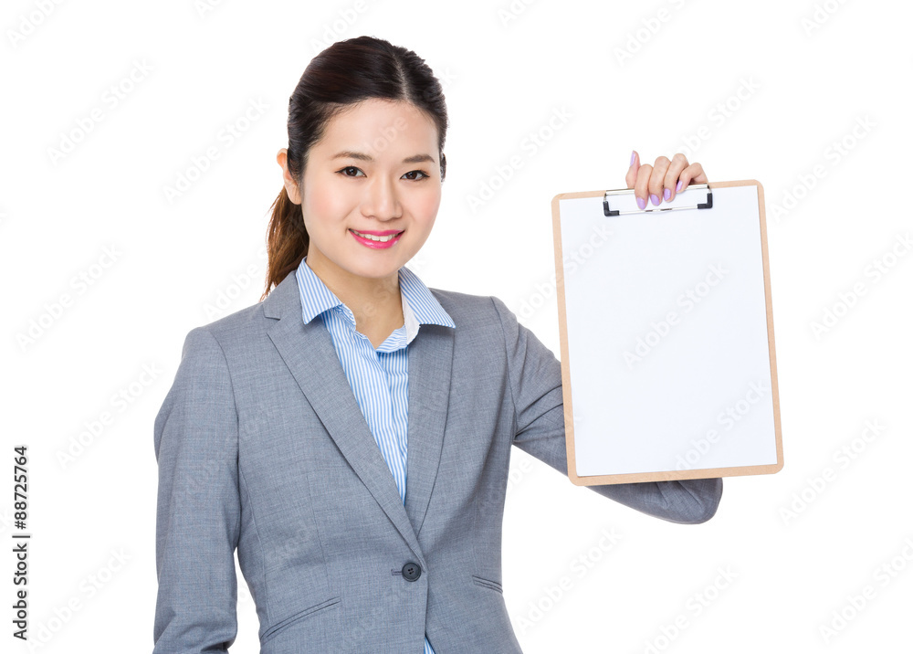 Businesswoman show with blank paper of clipboard Businesswoman show with blank paper of clipboard
