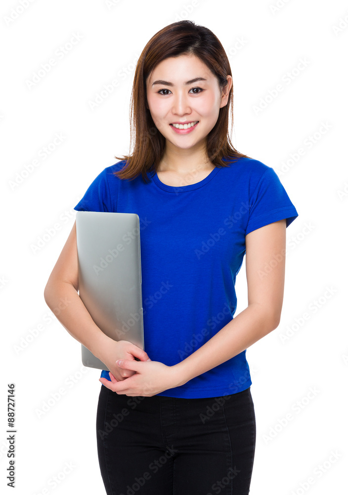 Young woman hold with notebook computer Young woman hold with notebook computer