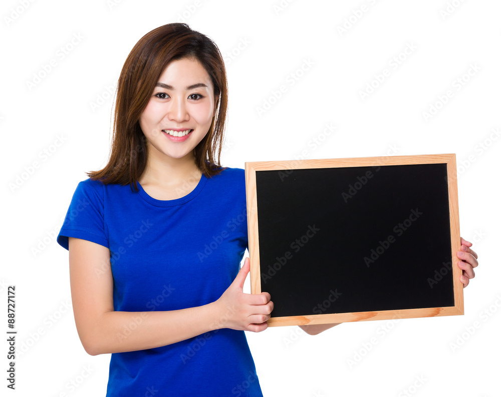 Young woman show with blank black board Young woman show with blank black board