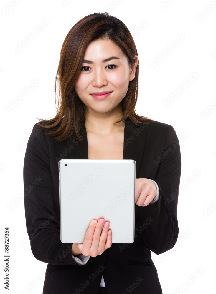 Asian young Businesswoman use of the tablet pc Asian young Businesswoman use of the tablet pc