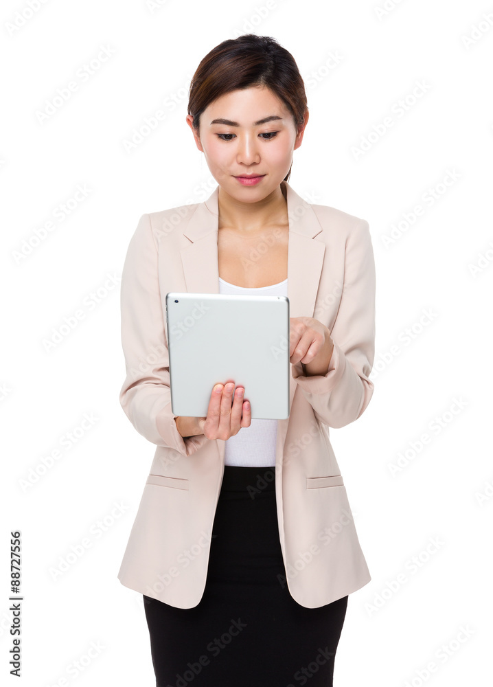 Businesswoman use of the tablet pc Businesswoman use of the tablet pc