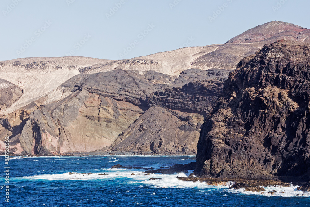 Sea surf on the rocks in area  Punta Pesebre  on Fuerteventura