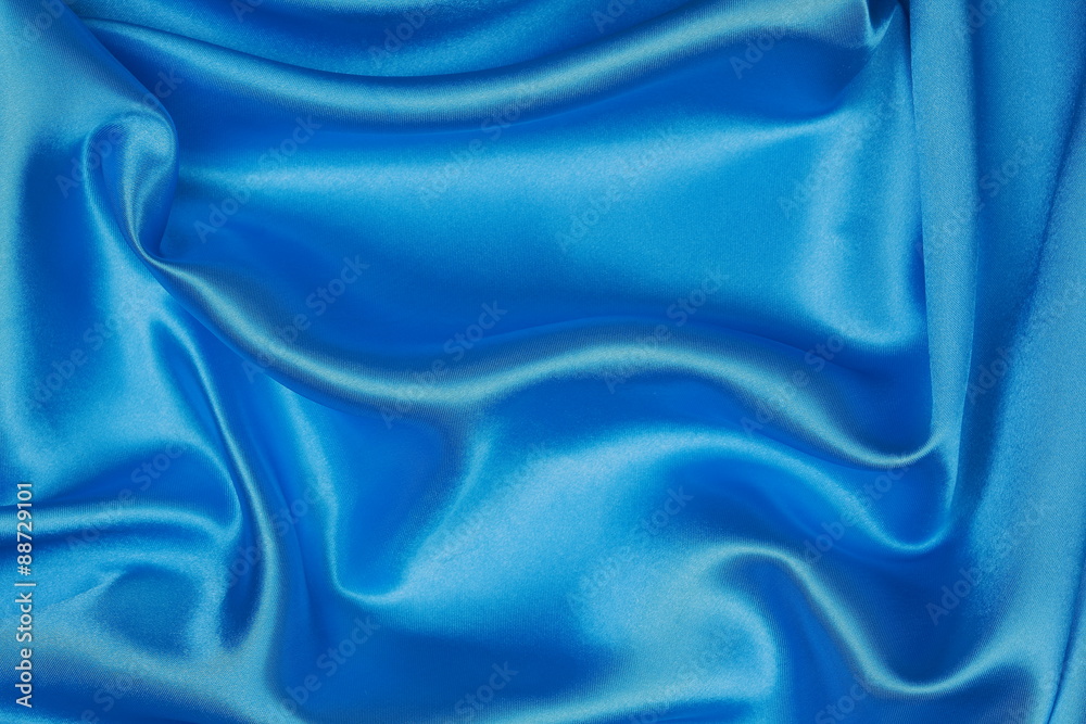 Obraz premium Blue Silk cloth of wavy abstract background