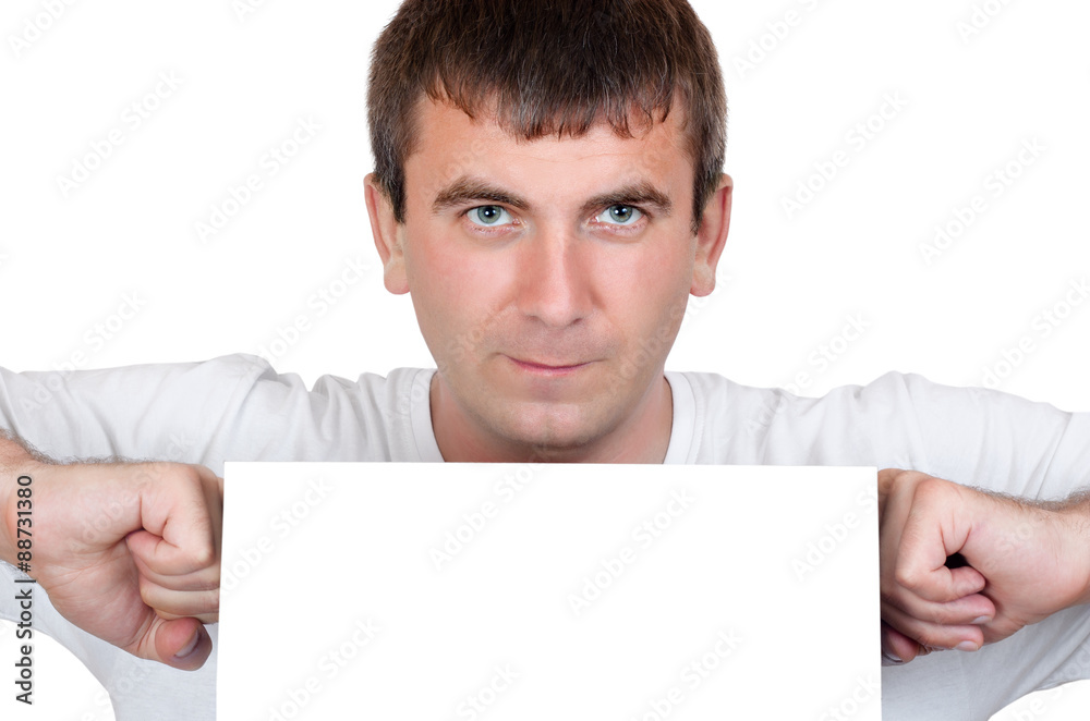 Man holding a blank white board between fist Man holding a blank white board between fist