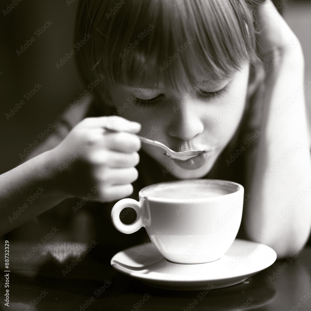 Boy drinking coffee Boy drinking coffee
