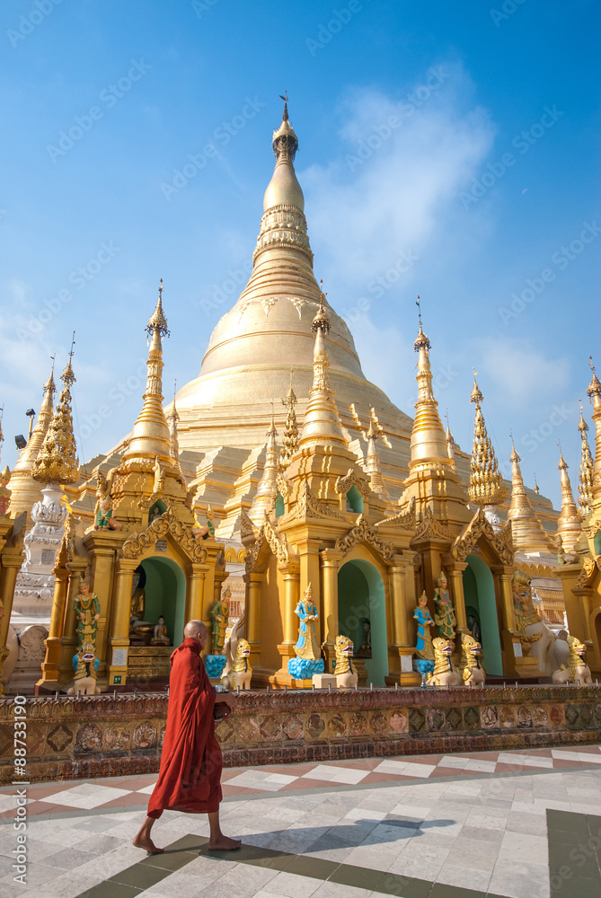 Buddhist monk walking in Shwedagon pagoda