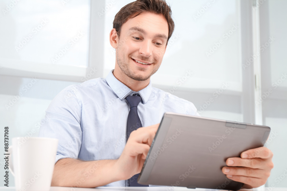 Call center operator holding laptop Call center operator holding laptop