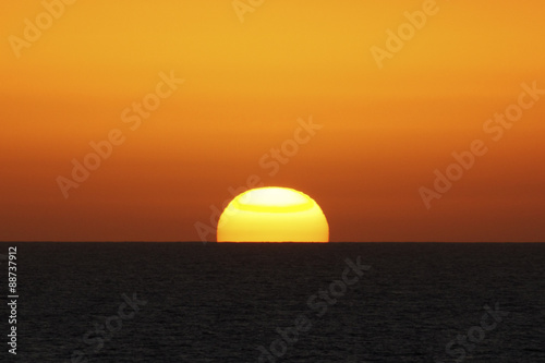 Fototapeta Naklejka Na Ścianę i Meble -  Sunset at sea from ship