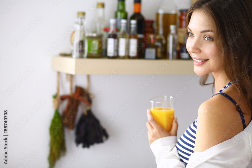 Portrait of a pretty woman holding glass with tasty juice Portrait of a pretty woman holding glass with tasty juice