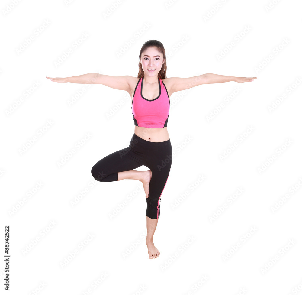 Young woman doing yoga exercise