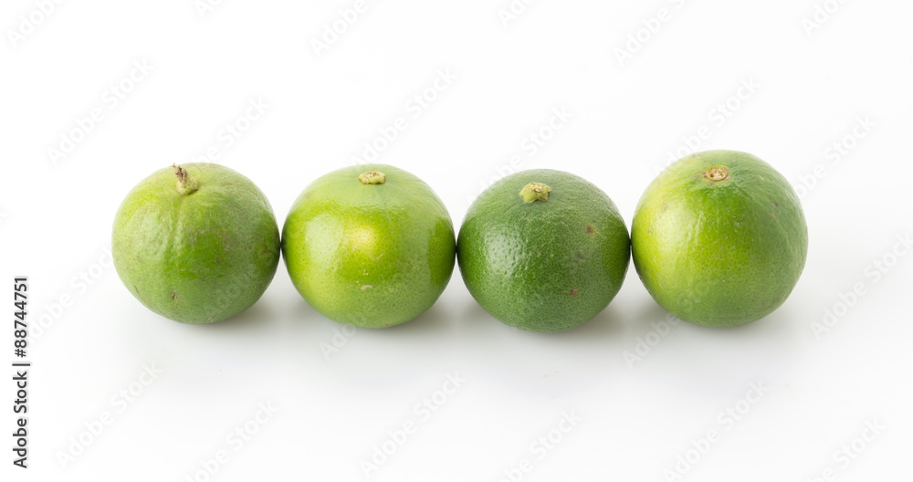 green lemon isolated on white background green lemon isolated on white background
