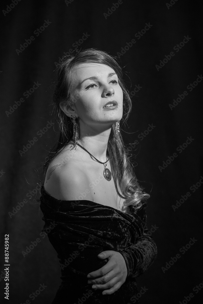 black and white portrait of pensive brunette girl 