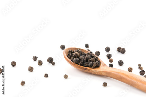 Black pepper with wood spoon