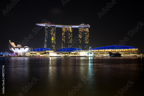 Marina Bay Sands hotel and Lotus Architecture highlighted at night in Singapore