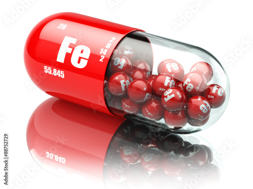 Pills with iron FE element Dietary supplements. Vitamin capsules photo