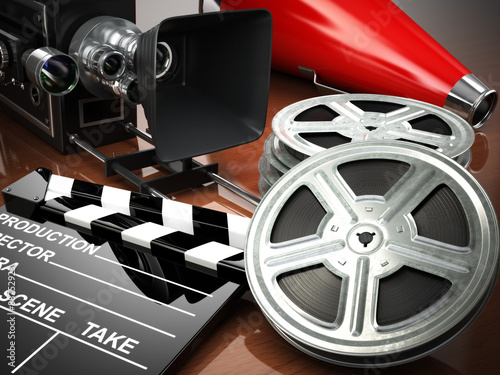 Video, movie, cinema vintage concept. Retro camera, reels and cl