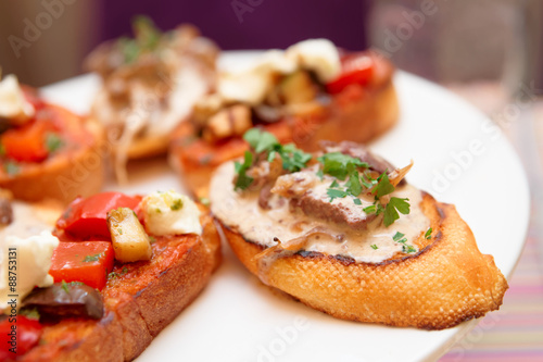 Bruschettas with vegetablea and liver