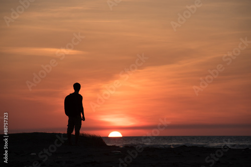 Silhouette man with sunset