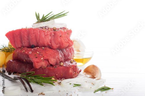 Raw beef steak and spices