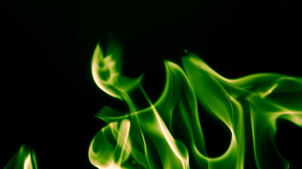 green flame fire on a black background