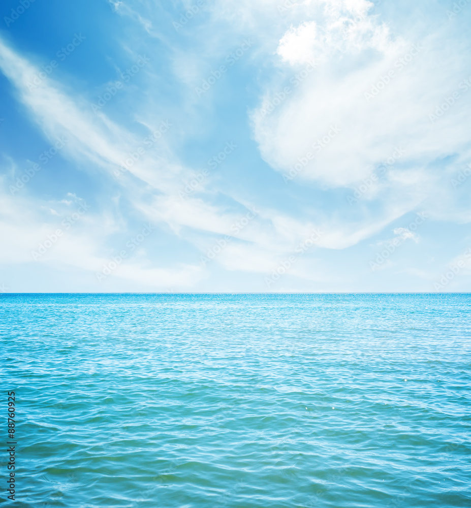 Fototapeta premium white clouds over blue sea